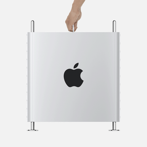 Mac Proâs aluminum housing being lifted off to show interior system.